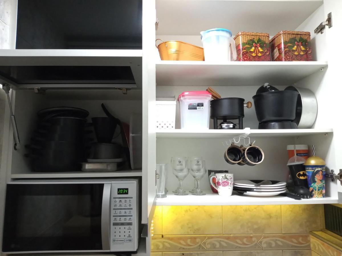 Sala living em prédio Familiar na Av da Praia Santos  Esterno foto