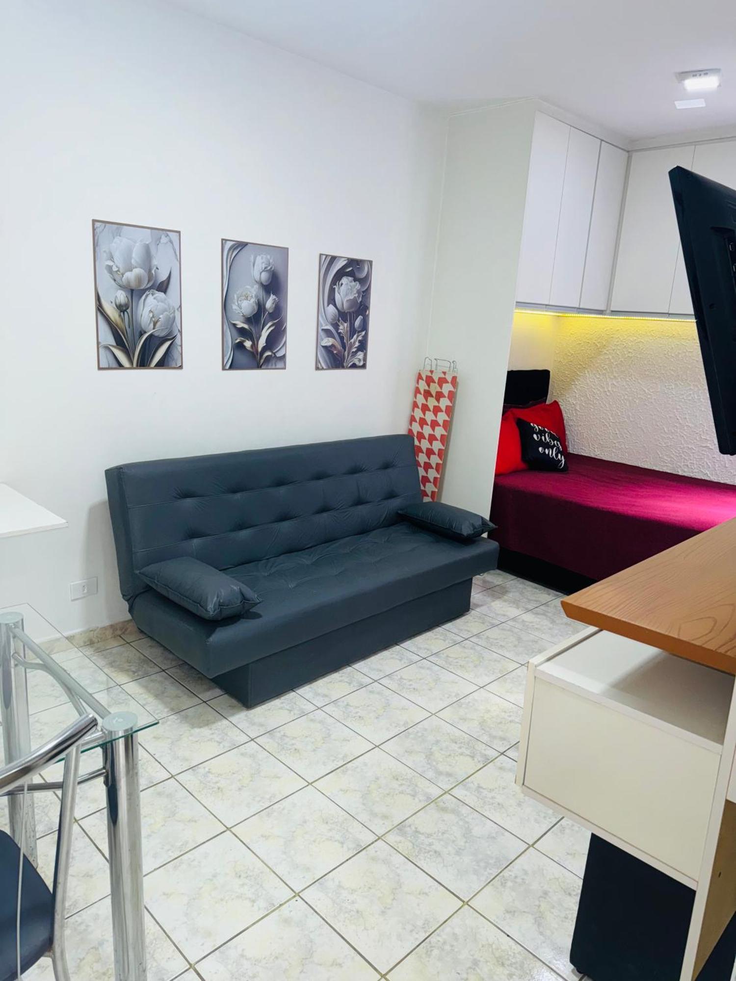 Sala living em prédio Familiar na Av da Praia Santos  Esterno foto